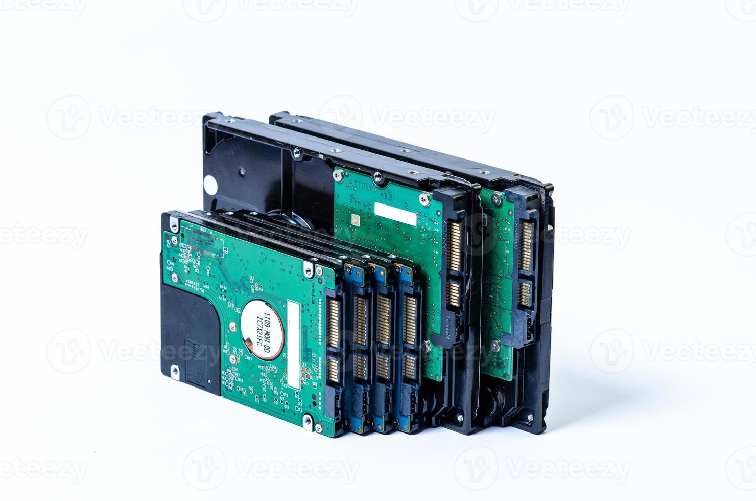 Hard disk drive HDD of different size isolated on white. photo