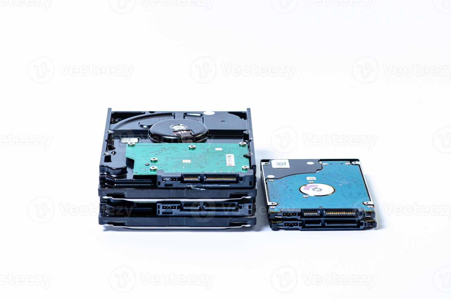 Hard disk drive HDD of different size isolated on white. photo