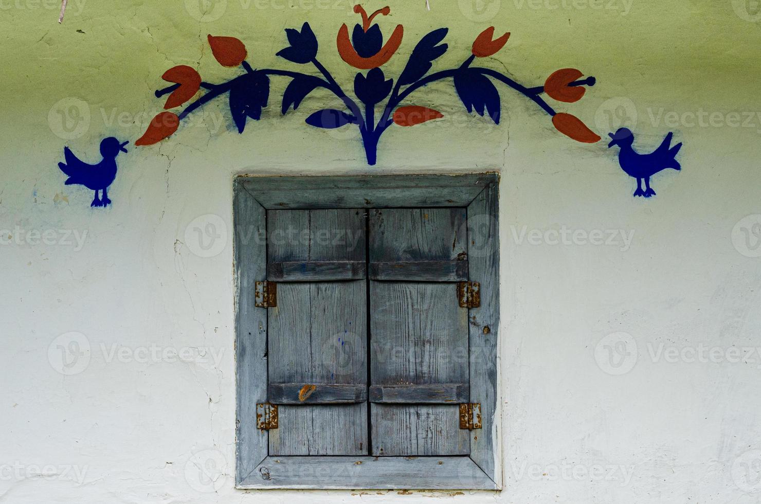 Window with wooden shutters photo