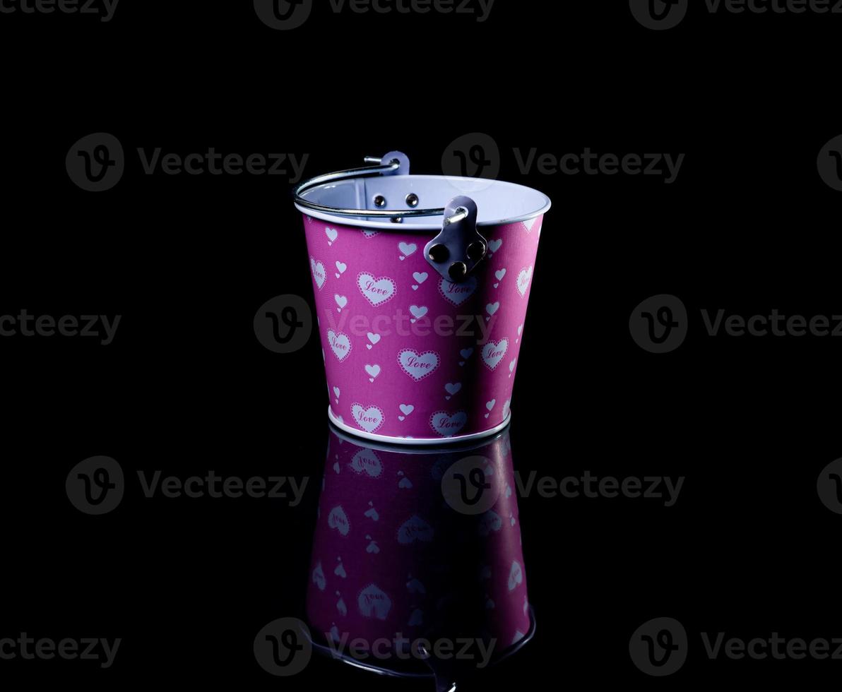 Many aluminum ice bucket laid in wait for use. many stainless multi-colored buckets photo