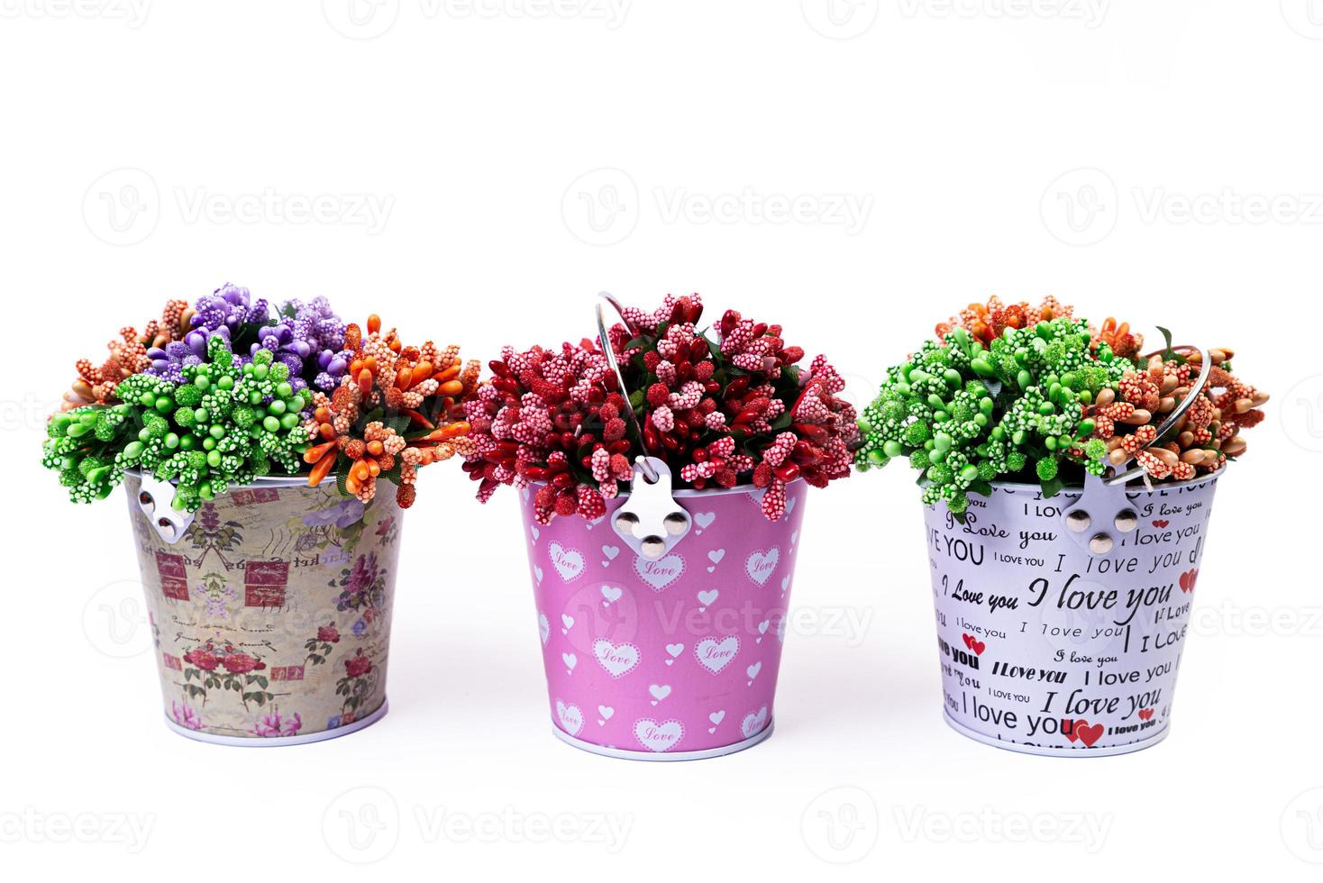 aluminum ice bucket laid in wait for use. stainless multi-colored bucket with green blue flowers photo