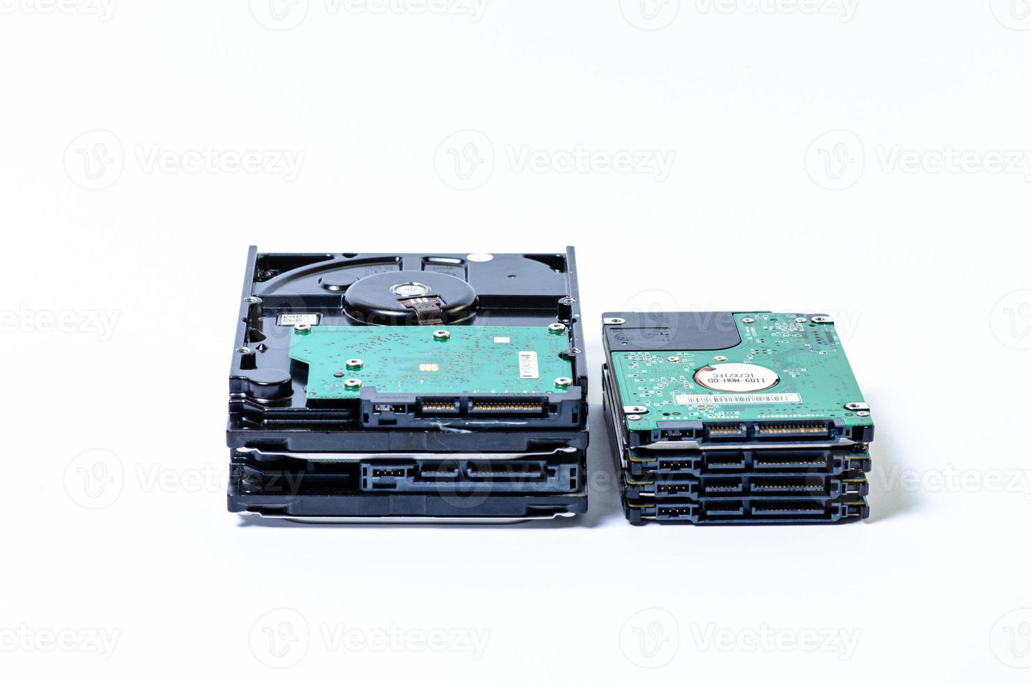 Hard disk drive HDD of different size isolated on white. photo