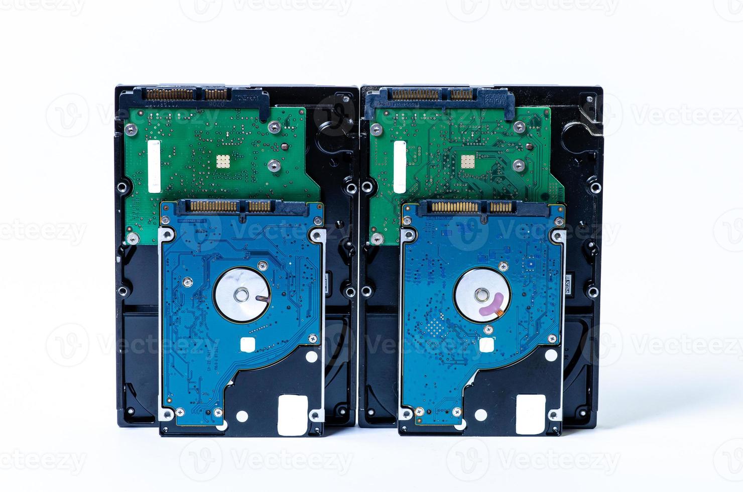 Hard disk drive HDD of different size isolated on white. photo