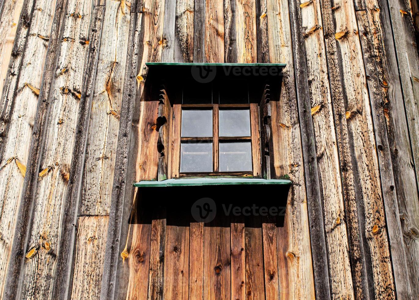 Window with wooden shutters photo