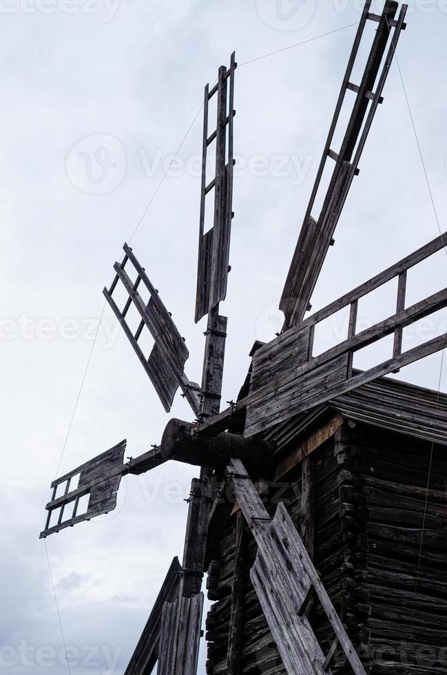 Summer landscape with an old wooden mill photo