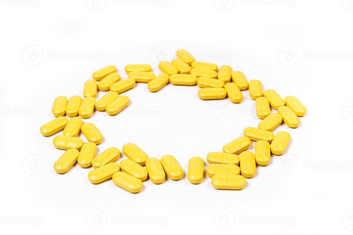 Medical orange pills on isolated on white background photo