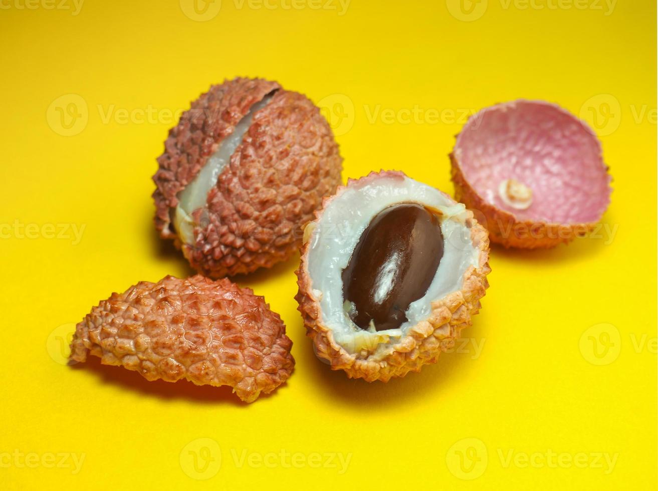 sliced lychee. Round pimply fruits. Chinese plum. fruit peel. photo