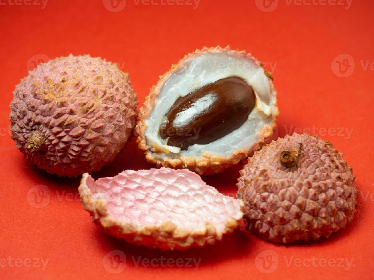 sliced lychee. Round pimply fruits. Chinese plum. fruit peel. photo