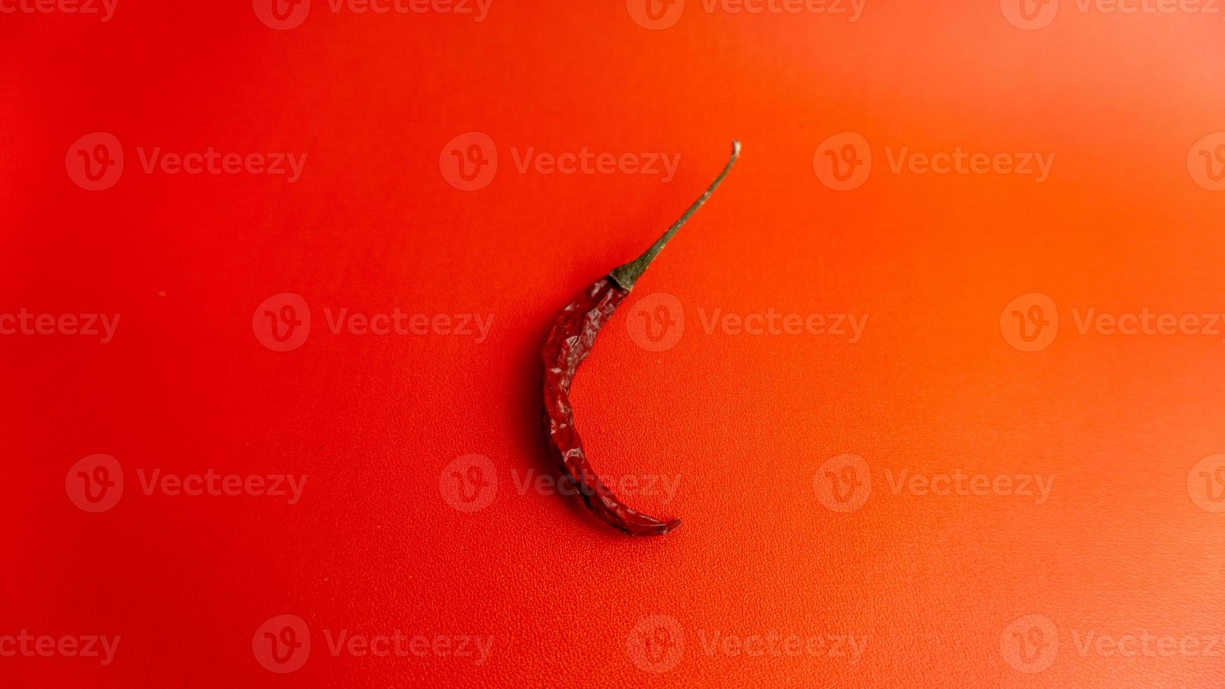 Close up of red dried chili on red backround photo