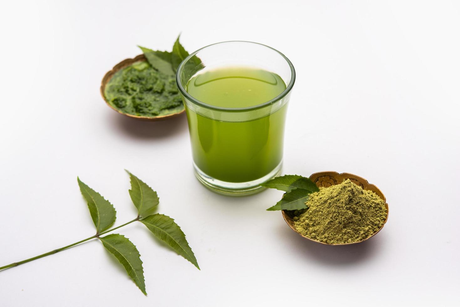Neem Powder, paste and juice. Azadirachta indica or commonly known as nimtree or Indian lilac photo