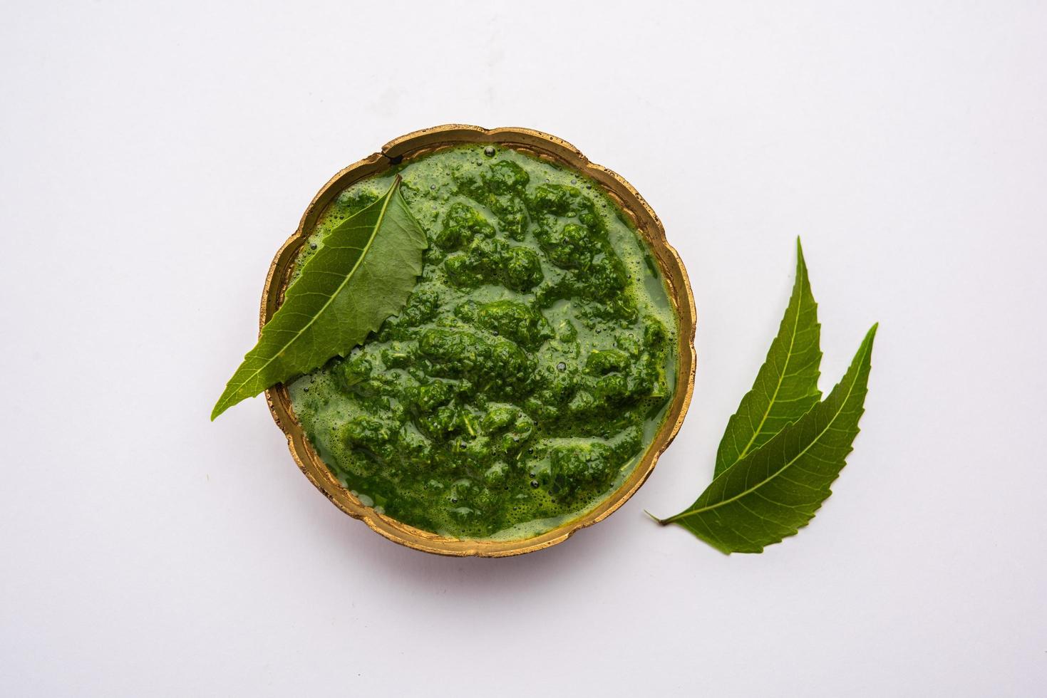 Neem Powder, paste and juice. Azadirachta indica or commonly known as nimtree or Indian lilac photo