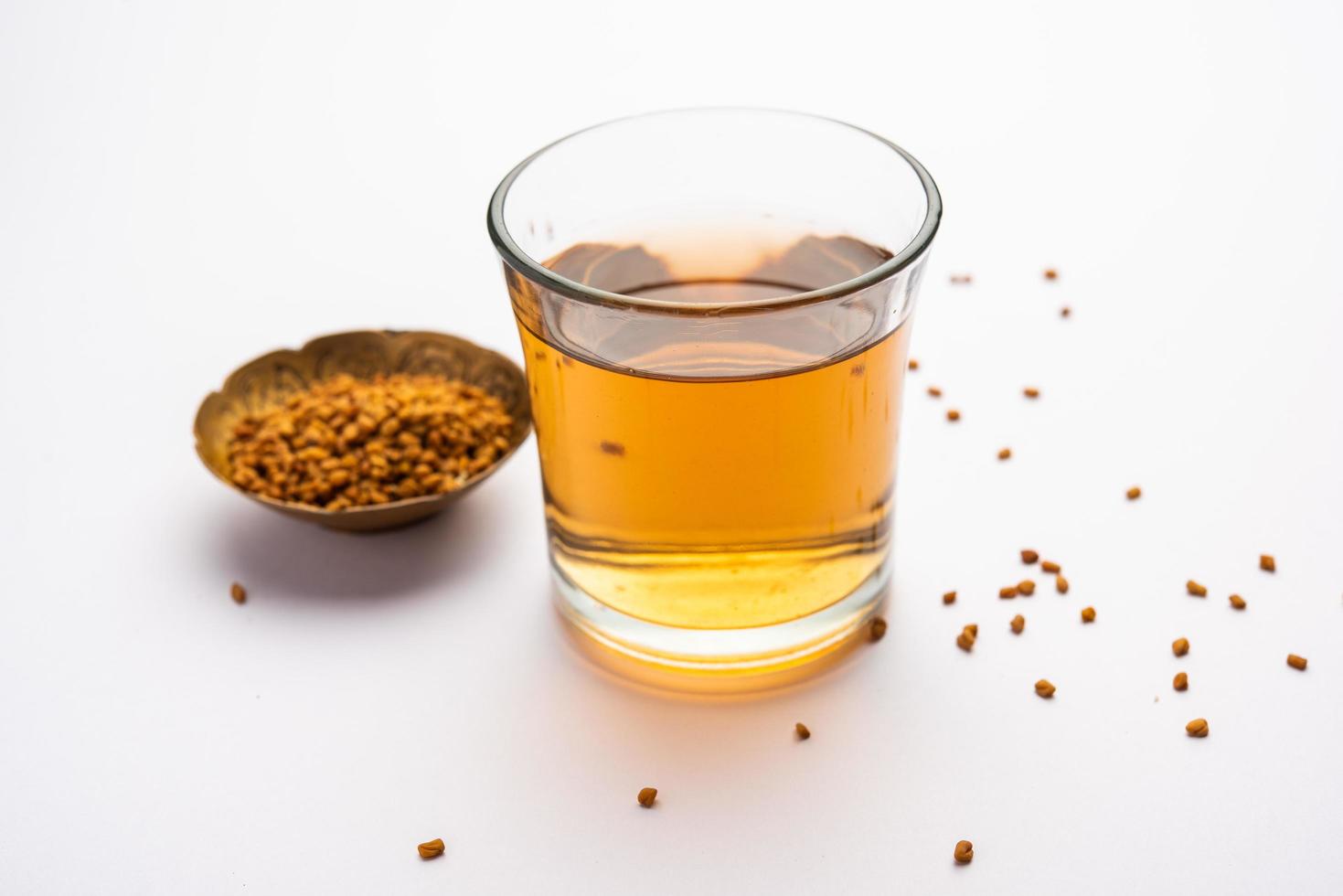 Fenugreek Seeds or Methi Dana drink by soaking it in water overnight. Indian Health tonic photo