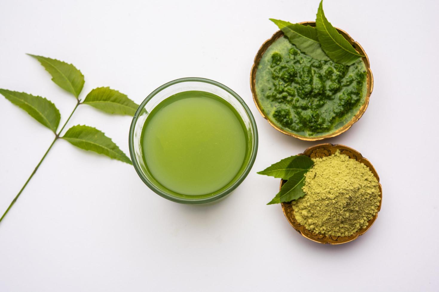 Neem Powder, paste and juice. Azadirachta indica or commonly known as nimtree or Indian lilac photo