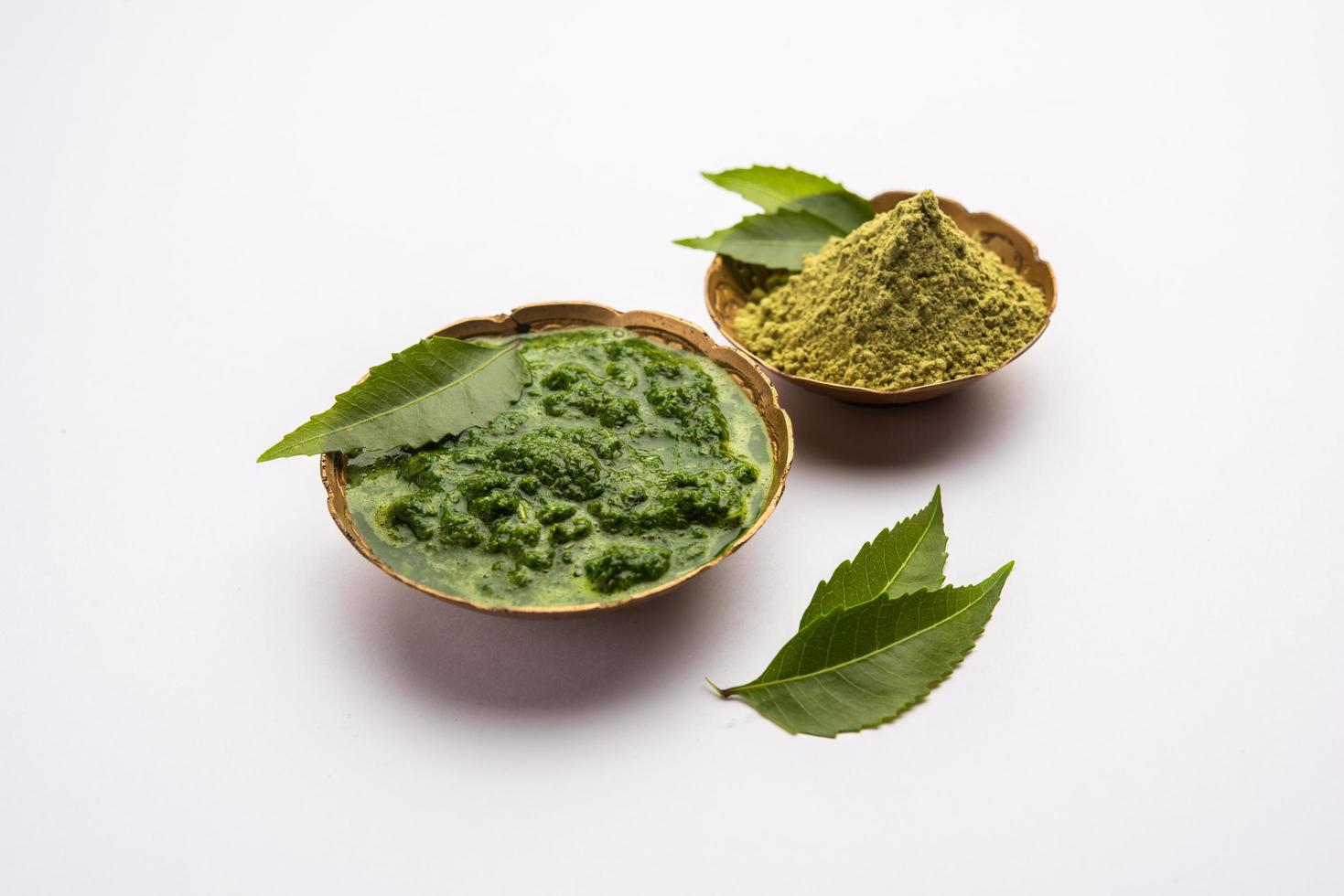 Neem Powder, paste and juice. Azadirachta indica or commonly known as nimtree or Indian lilac photo