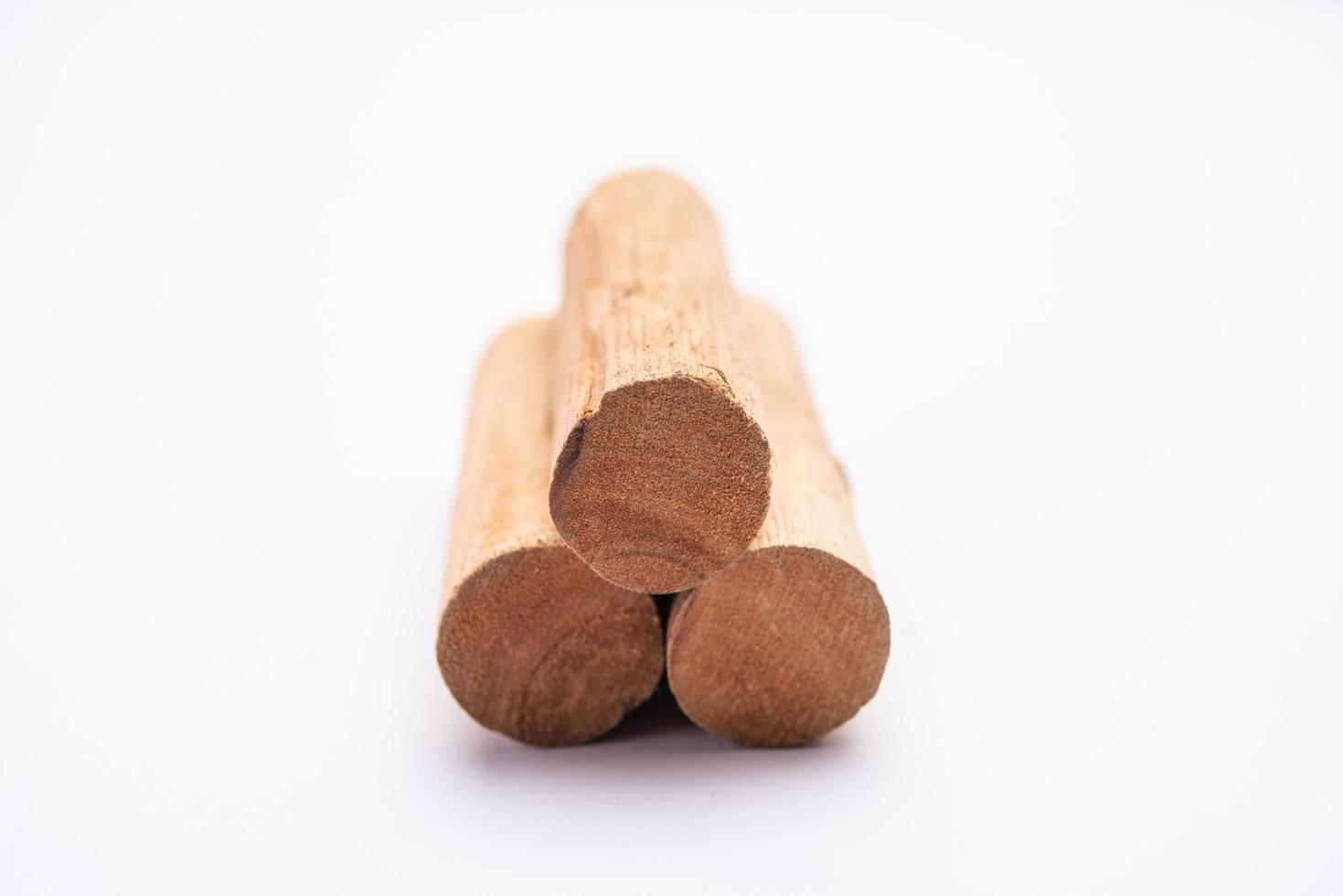 Chandan or sandalwood powder with sticks, perfume or oil which retain their fragrance for decades photo