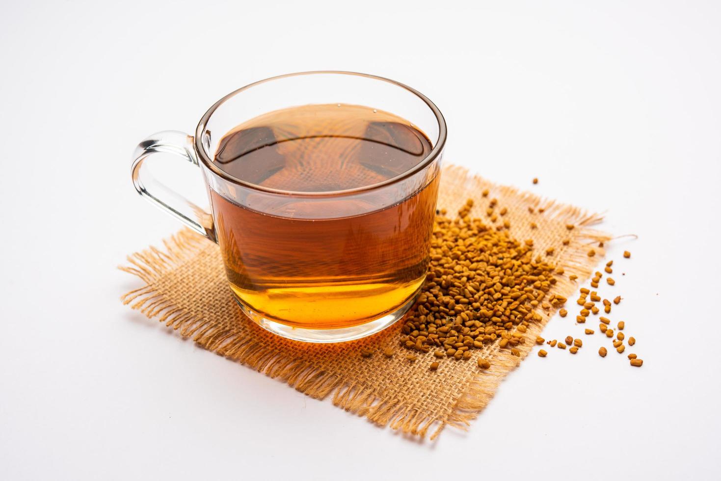 Fenugreek Seeds or Methi Dana drink by soaking it in water overnight. Indian Health tonic photo