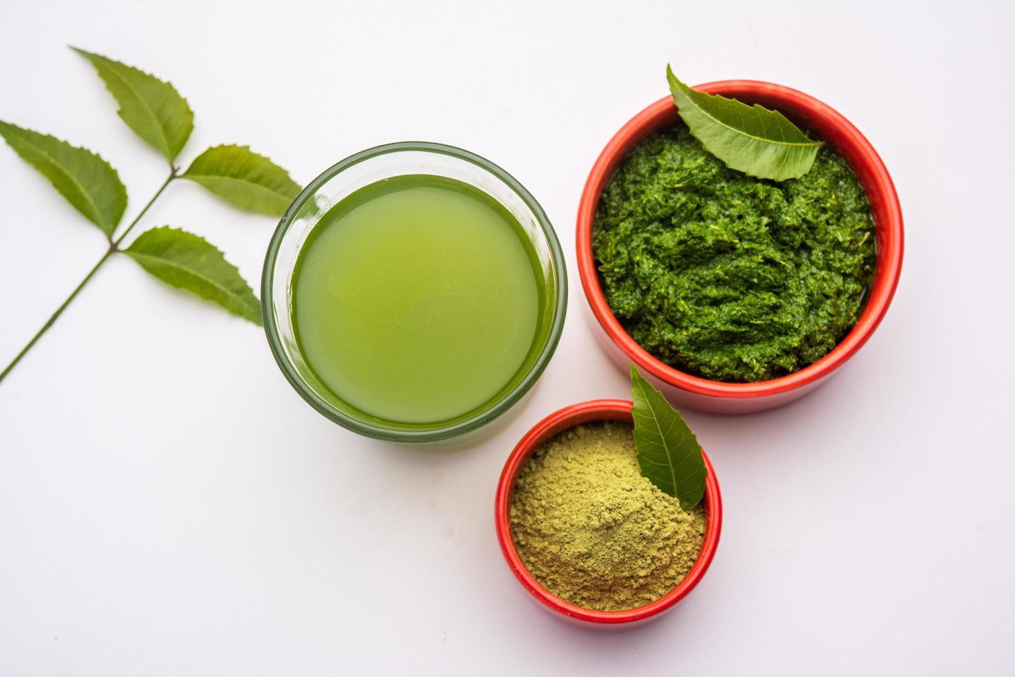 Neem Powder, paste and juice. Azadirachta indica or commonly known as nimtree or Indian lilac photo