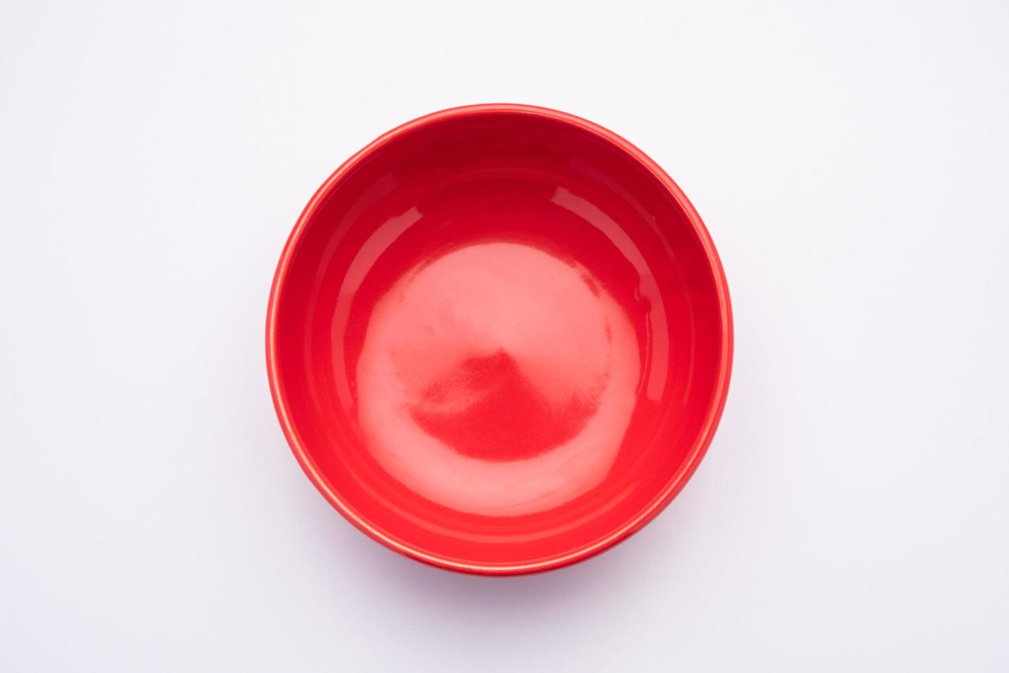 Empty Red ceramic bowl or container photo