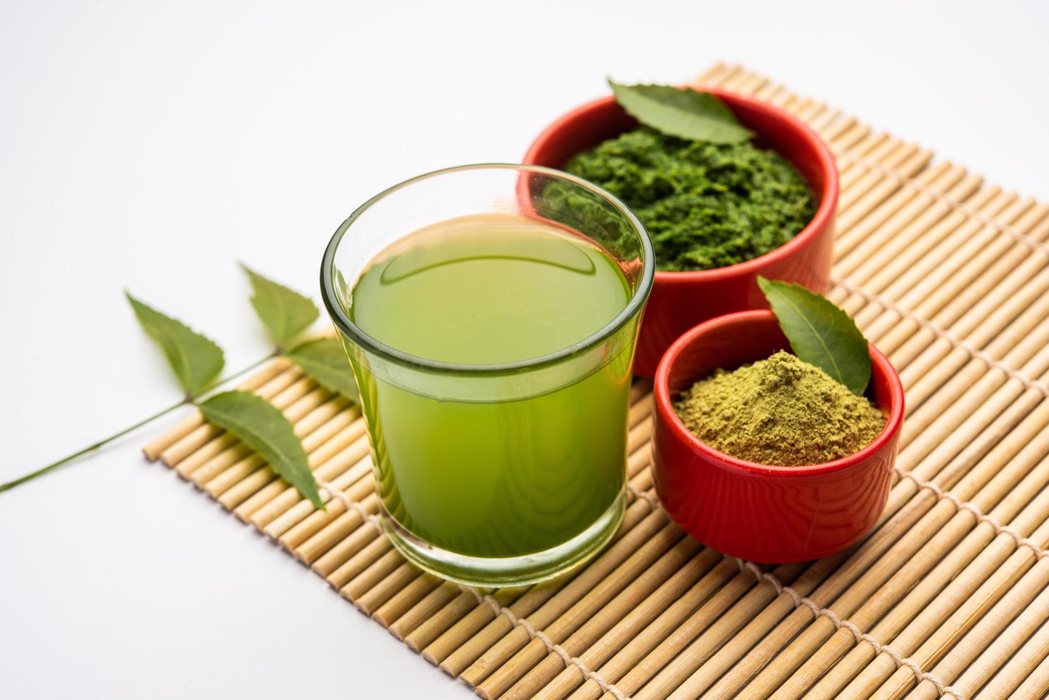 Neem Powder, paste and juice. Azadirachta indica or commonly known as nimtree or Indian lilac photo