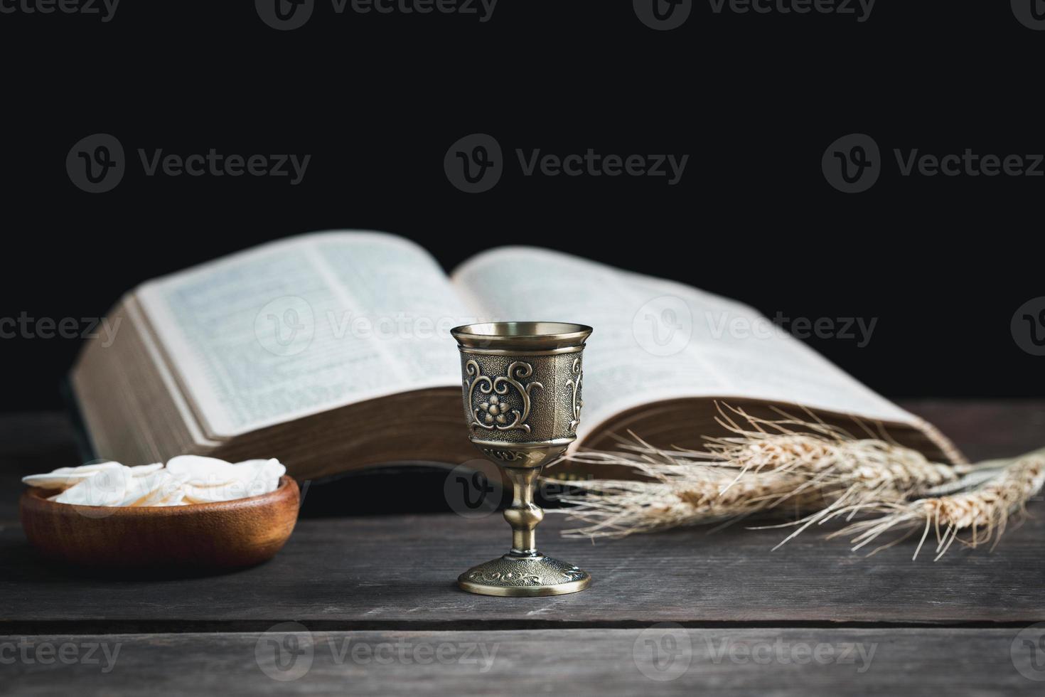 Concept of Eucharist or holy communion of Christianity. Eucharist is sacrament instituted by Jesus. during last supper with disciples. Bread and wine is body and blood of Jesus Christ of Christians. photo