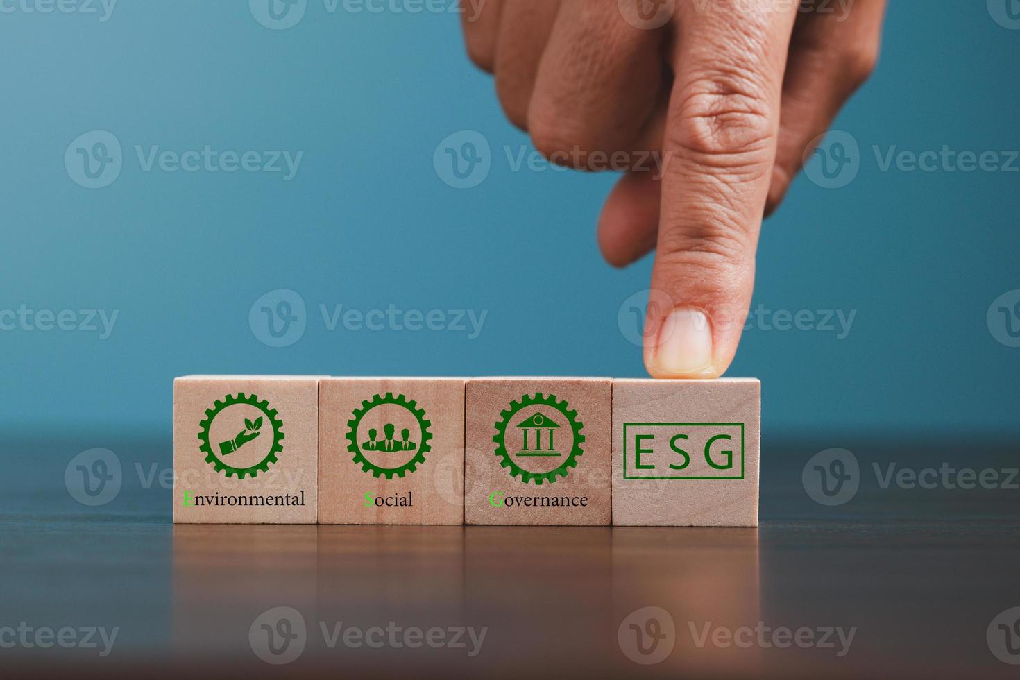 ESG - short for environmental social governance. Environment is company's responsibility. Social is employees, suppliers, customers. Governance is effective, transparent, auditable management. photo