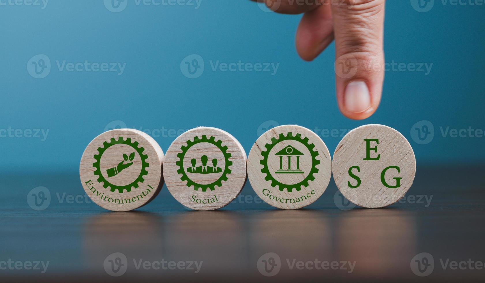 ESG - short for environmental social governance. Environment is company's responsibility. Social is employees, suppliers, customers. Governance is effective, transparent, auditable management. photo
