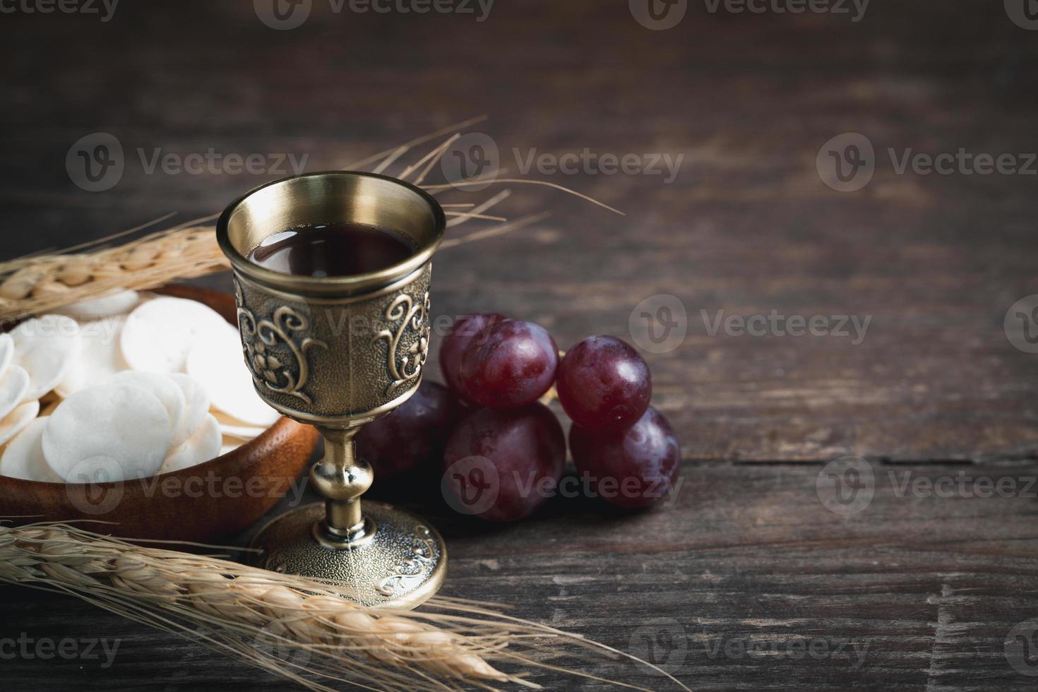 Concept of Eucharist or holy communion of Christianity. Eucharist is sacrament instituted by Jesus. during last supper with disciples. Bread and wine is body and blood of Jesus Christ of Christians. photo