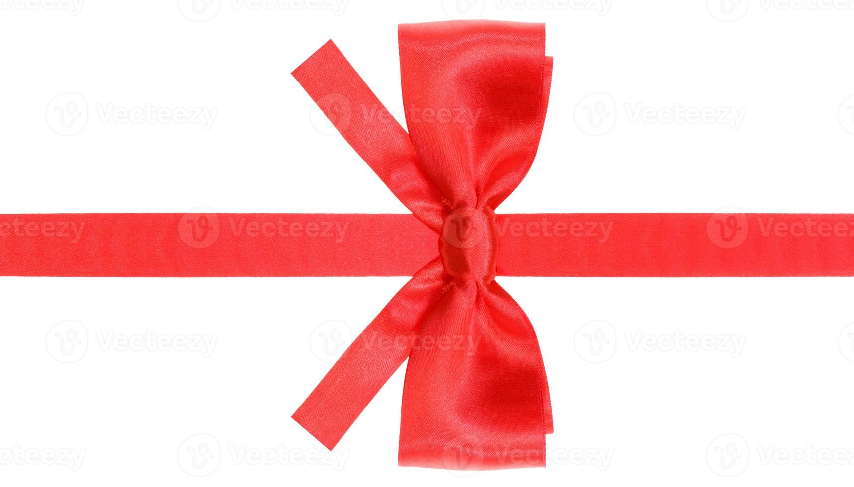 symmetric red bow with square cut ends on ribbon photo