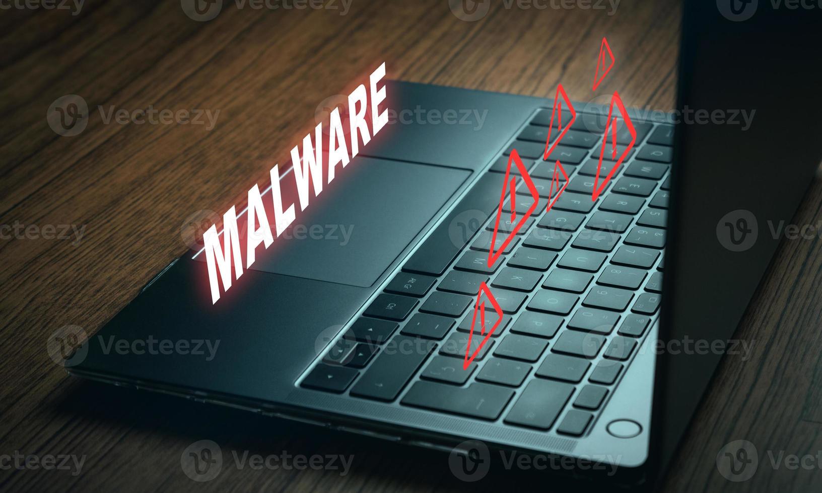 VR warning malware screen on laptop. Cyber security data protection business technology. photo