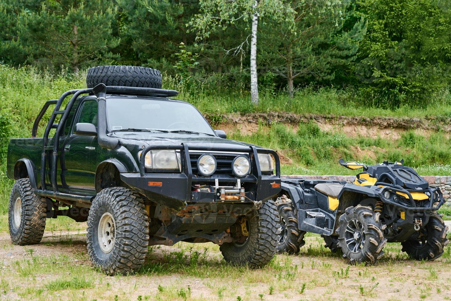 Old car SUV and quad bike outdoor, front view photo
