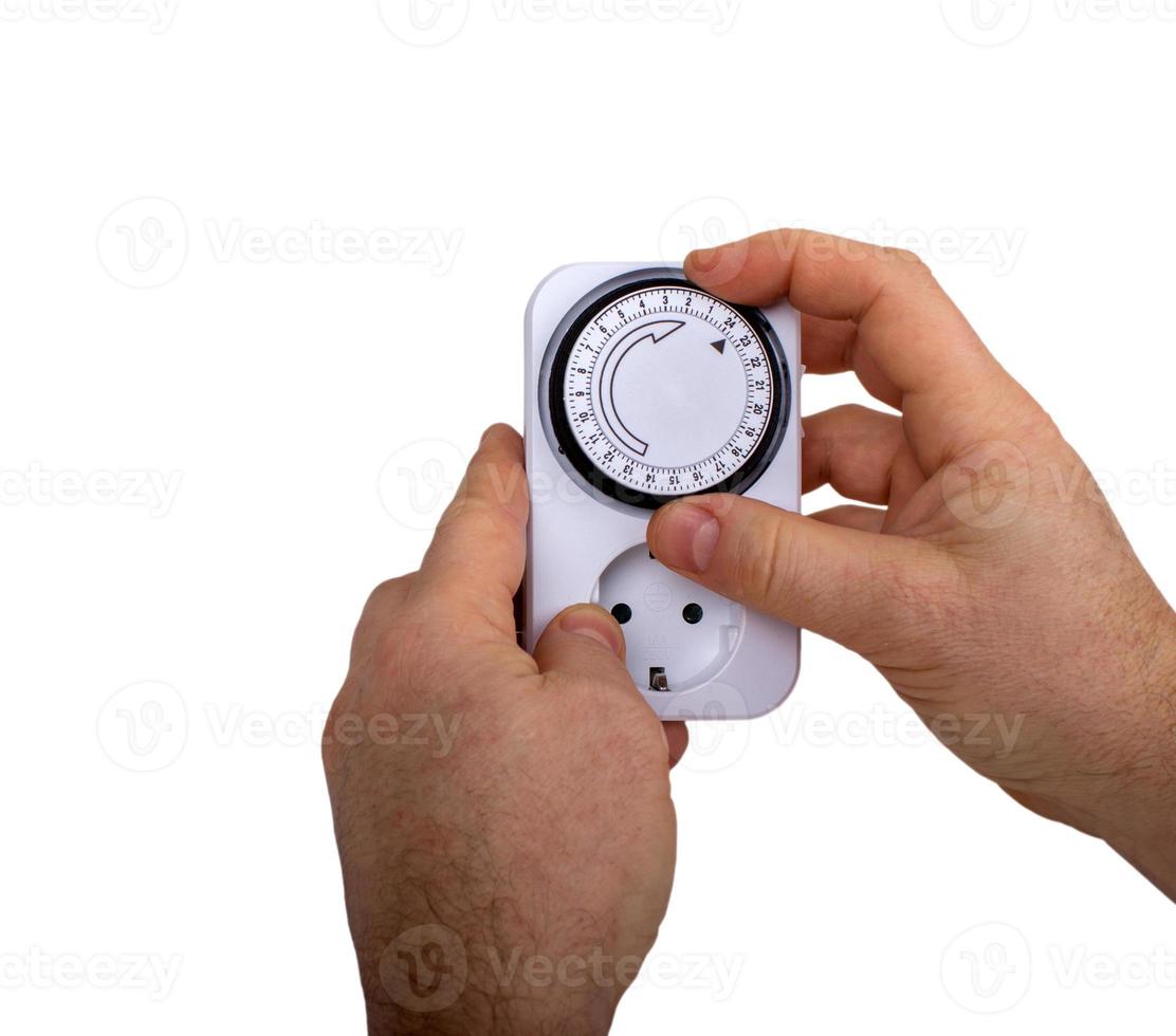 Man Adjusting Timer photo
