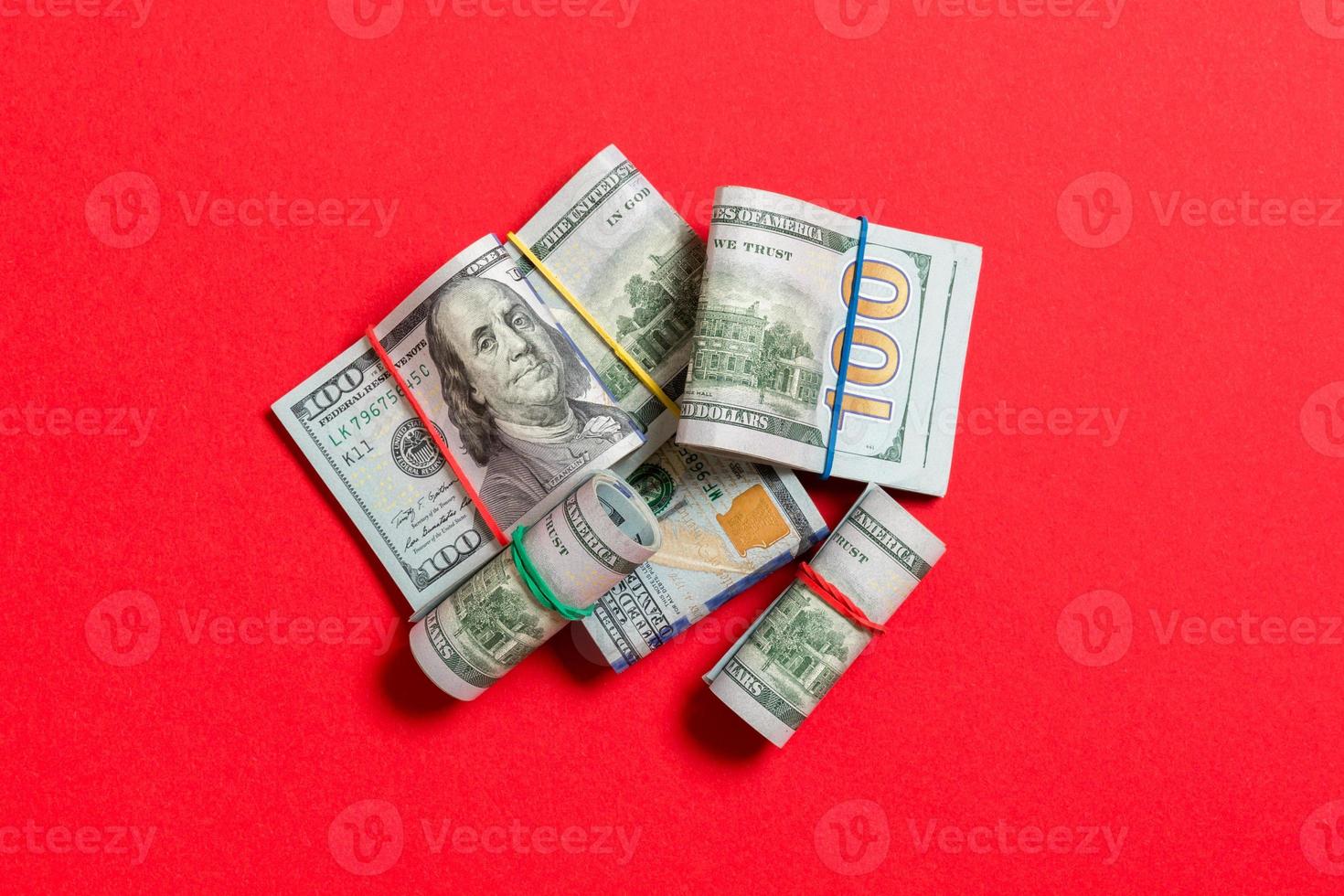 Many Stack of 100 dollar bills. Isolated on colored background top wiev with copy space photo