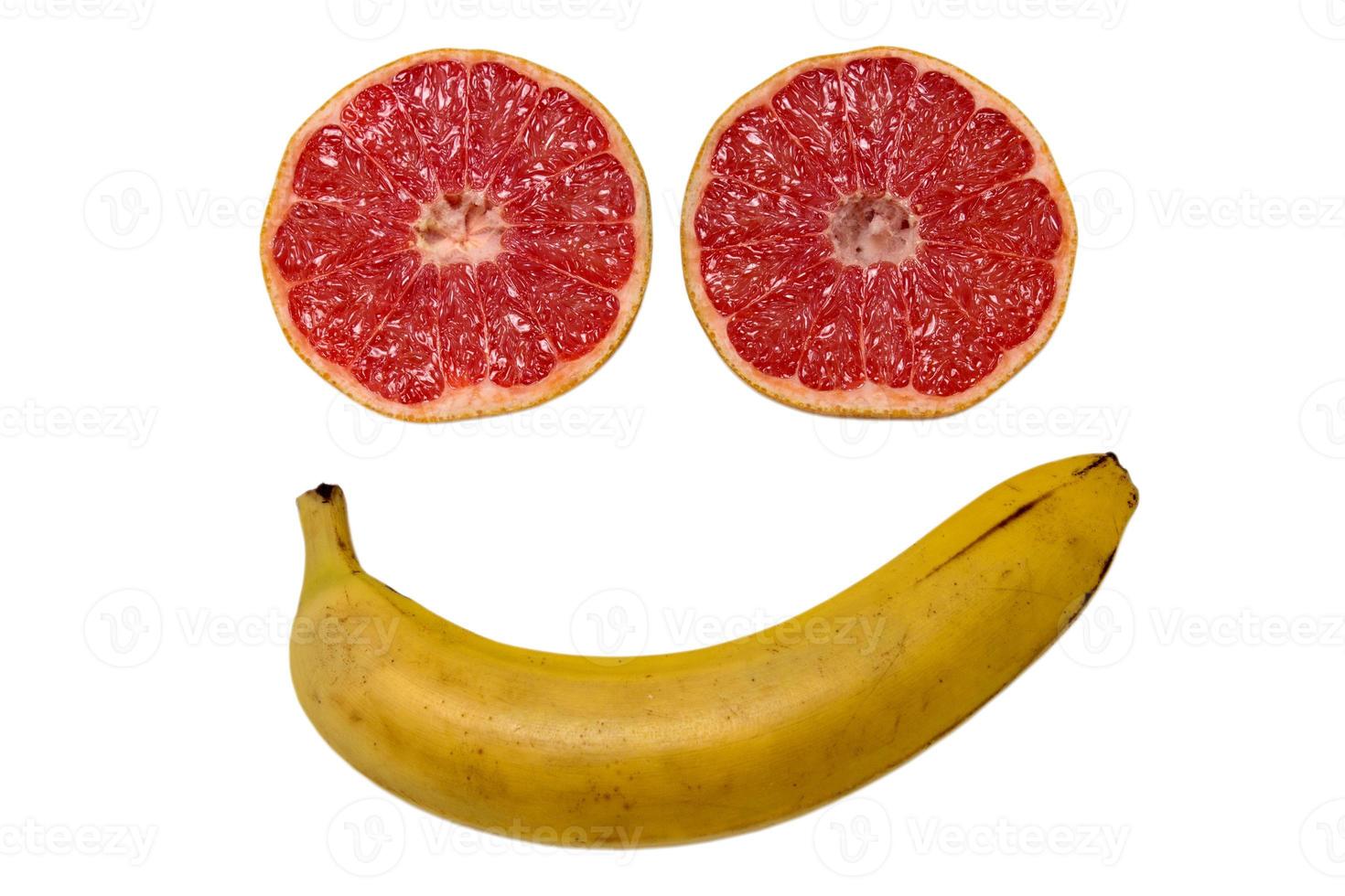 Smiled face made from fruits isolated photo