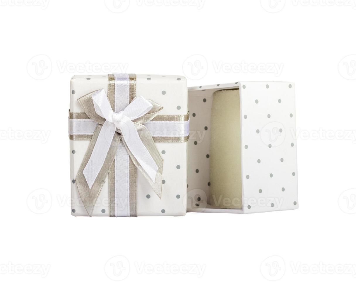 White empty gift box with small circles gray fabric tape with gray tie.Isolated white. photo