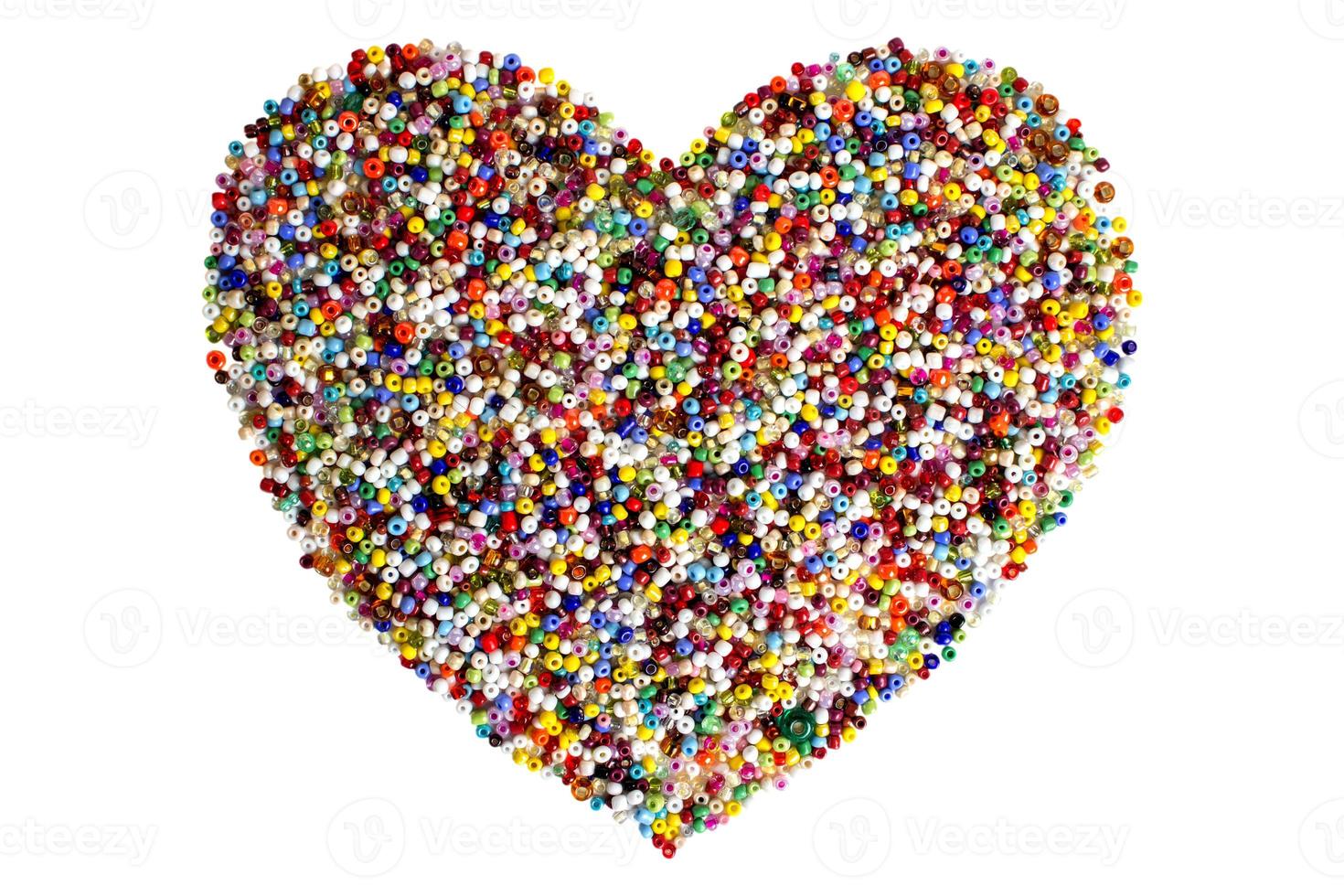 Colorful beads heart shape isolated photo