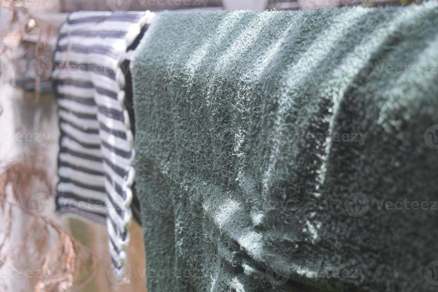 drying process of bathroom towel.  towels hanging on rack bar photo