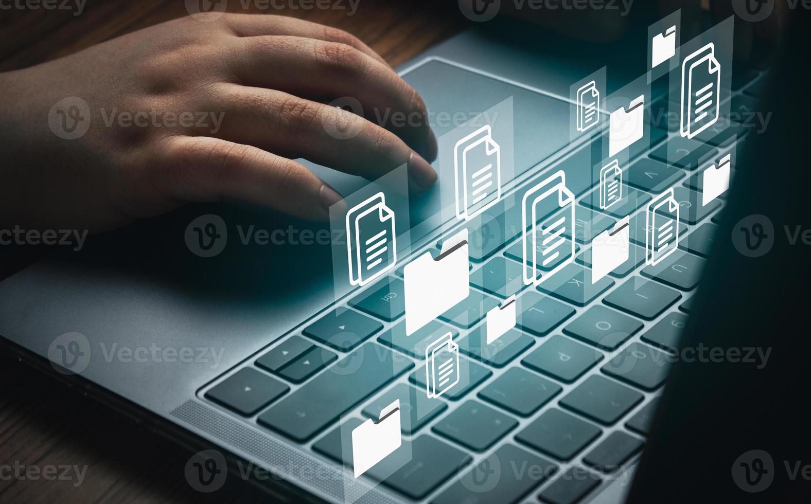 Businesswoman using laptop to Document Management System DMS. Digital file storage. Database technology. Corporate business. photo