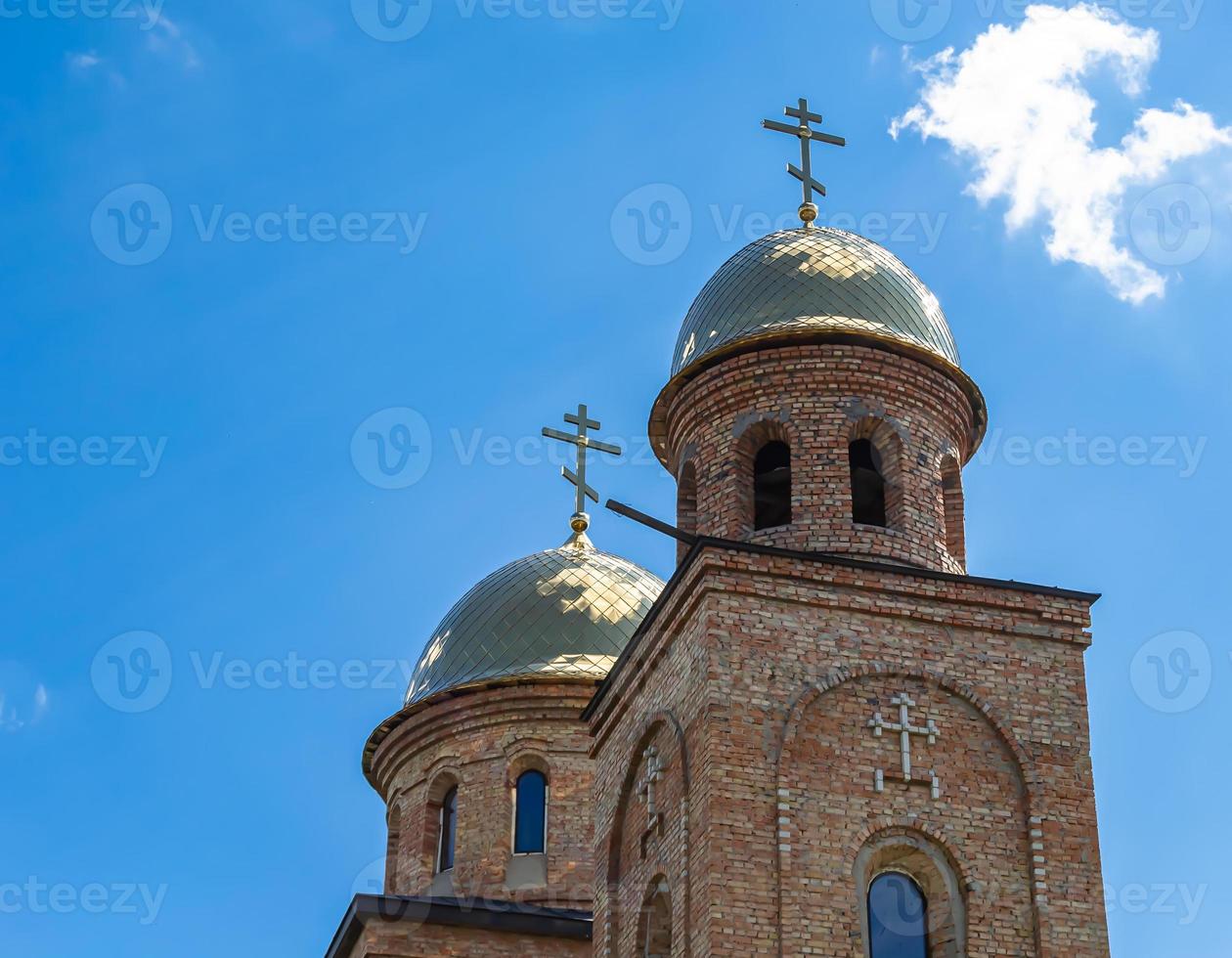 Christian church cross in high steeple tower for prayer photo