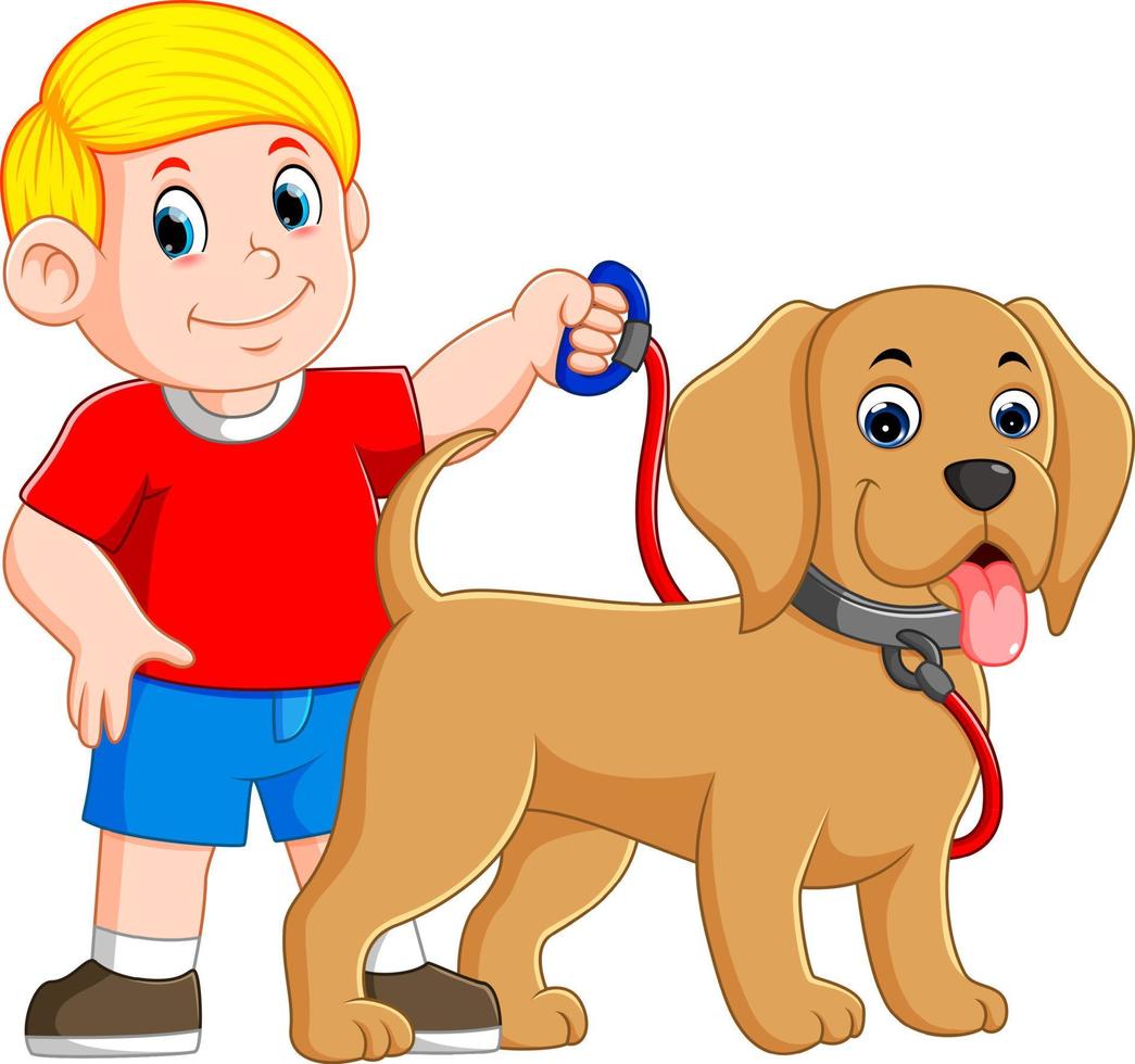 un niño sostiene la cuerda roja y está parado al lado del perro vector