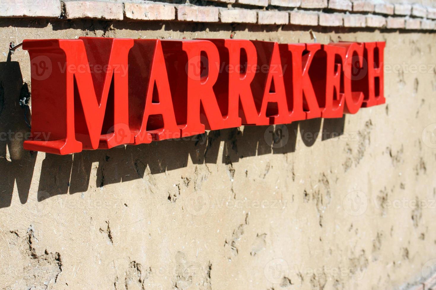 The word Marrakech spelled in red letters photo