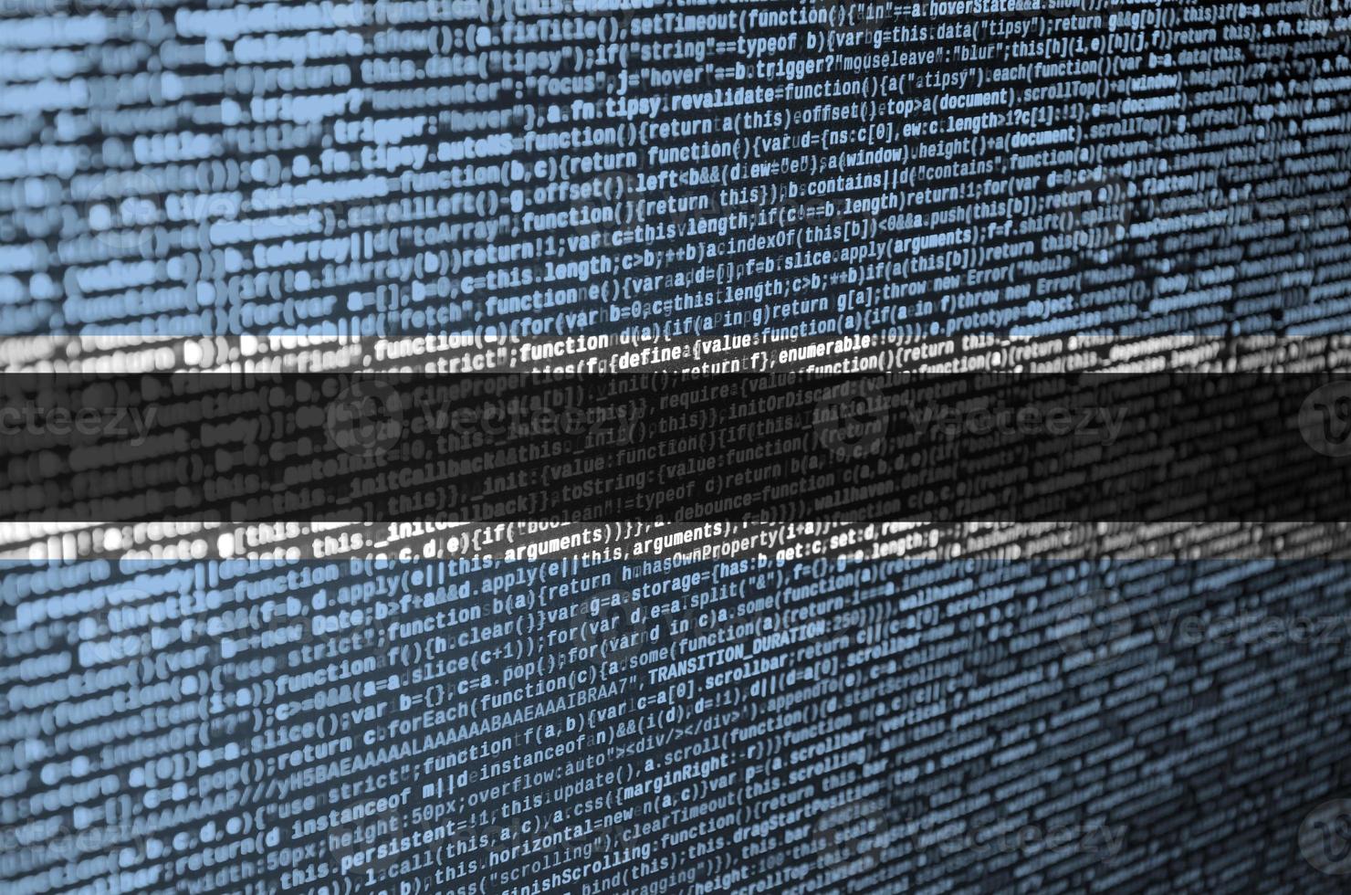 Botswana flag is depicted on the screen with the program code. The concept of modern technology and site development photo