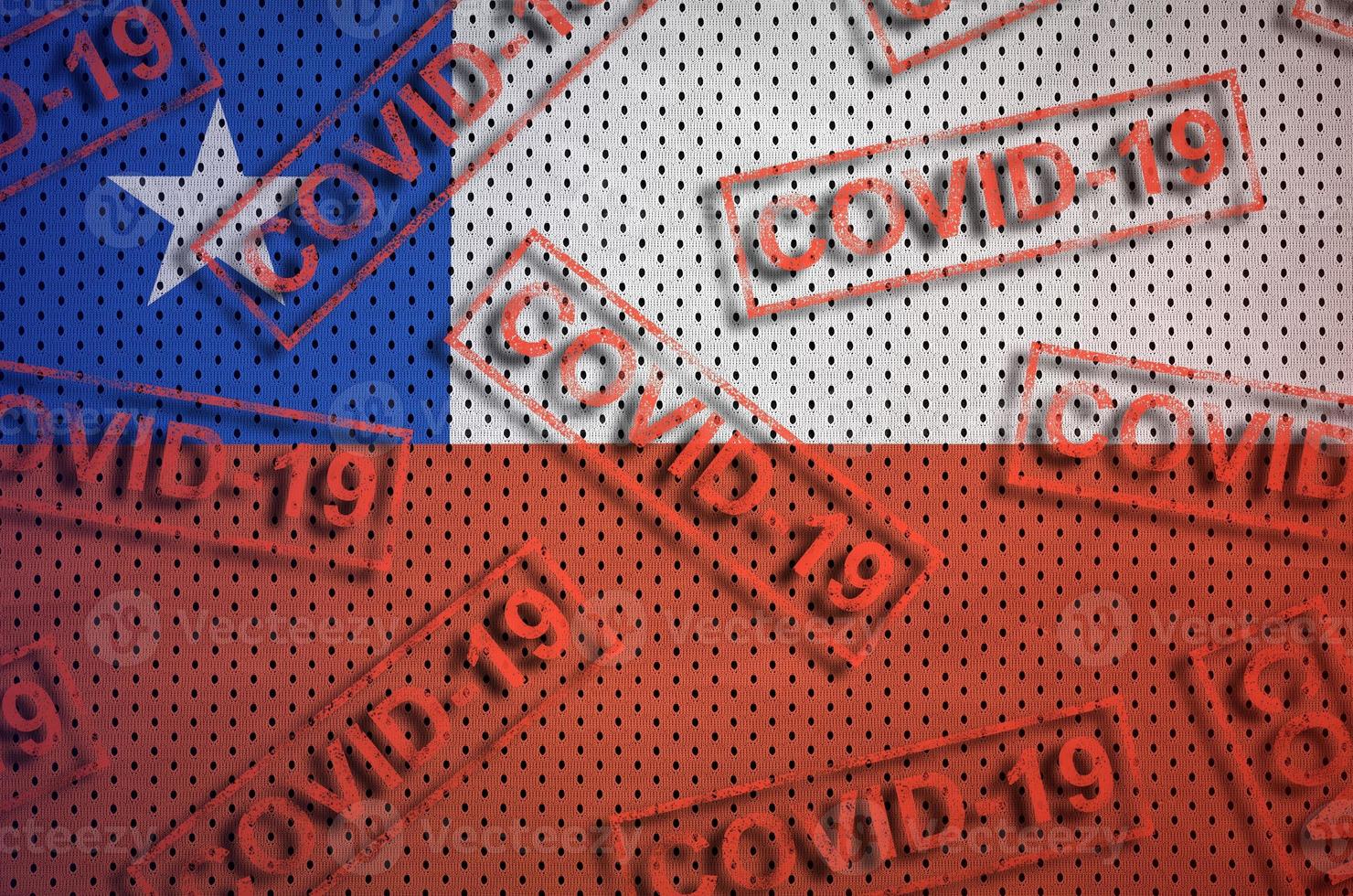 Chile flag and many red Covid-19 stamps. Coronavirus or 2019-nCov virus concept photo