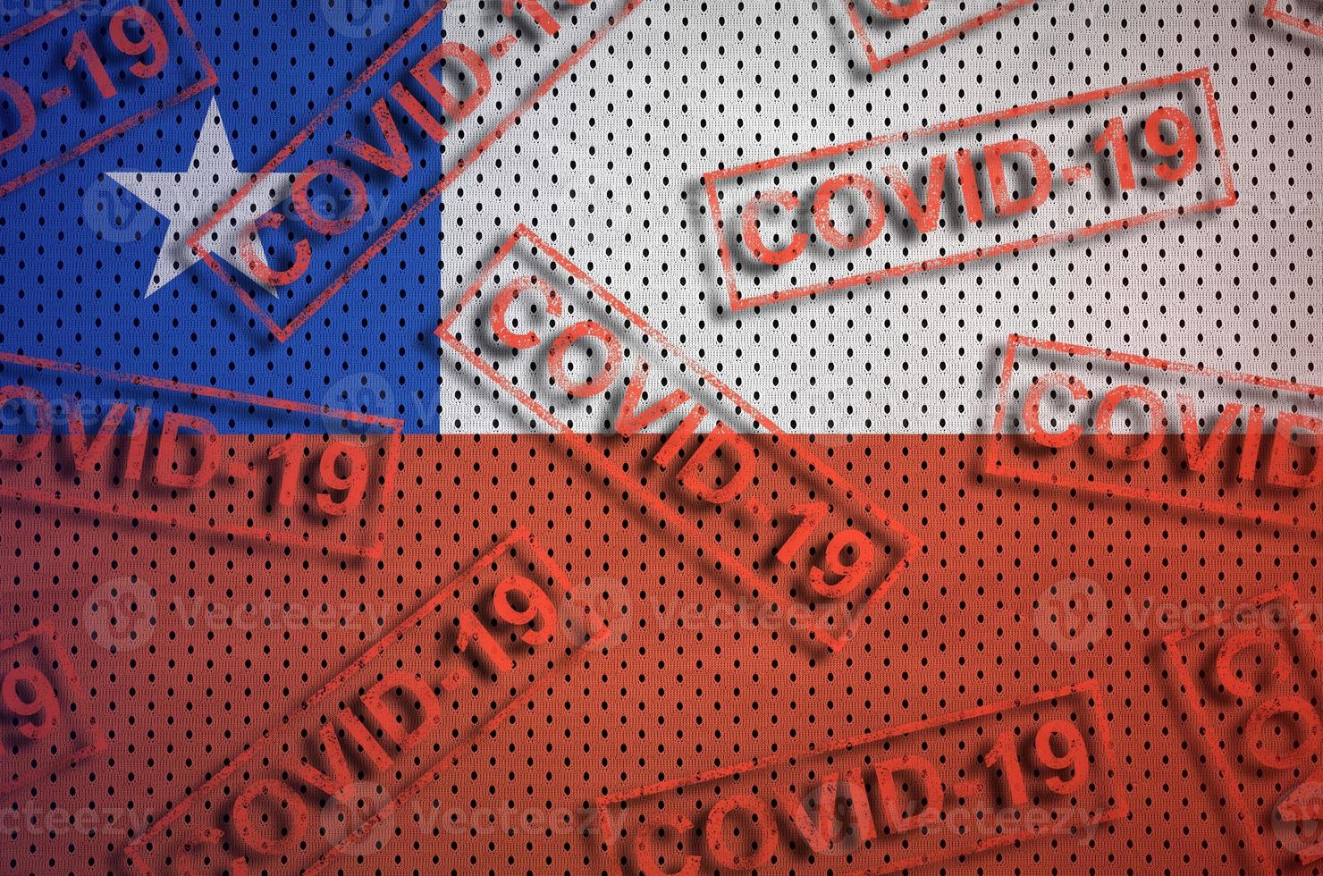 Chile flag and many red Covid-19 stamps. Coronavirus or 2019-nCov virus concept photo