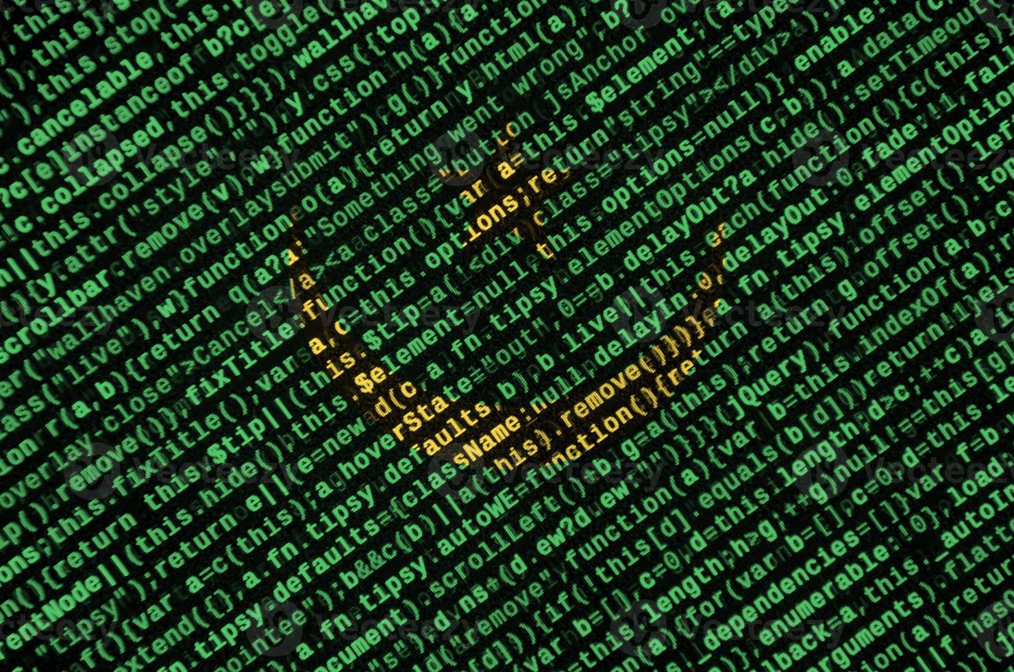 Mauritania flag is depicted on the screen with the program code. The concept of modern technology and site development photo