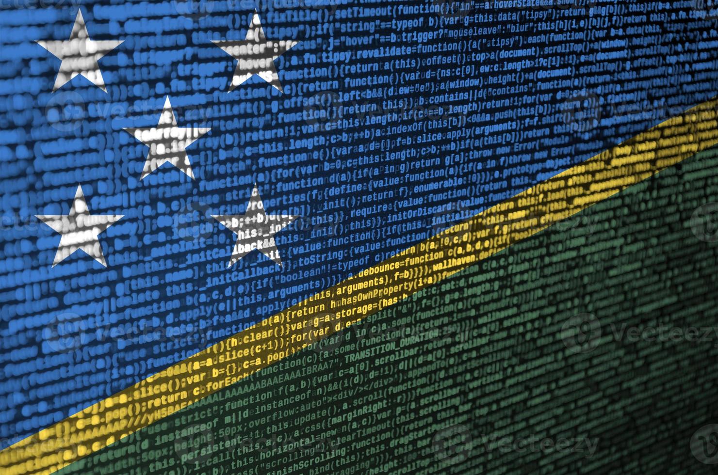 Solomon Islands flag is depicted on the screen with the program code. The concept of modern technology and site development photo