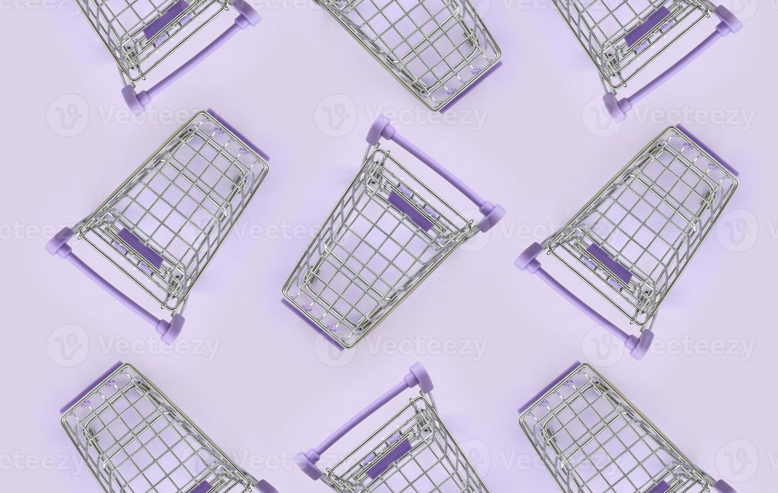 Pattern of many small shopping carts on a violet background. Minimalism flat lay top view photo