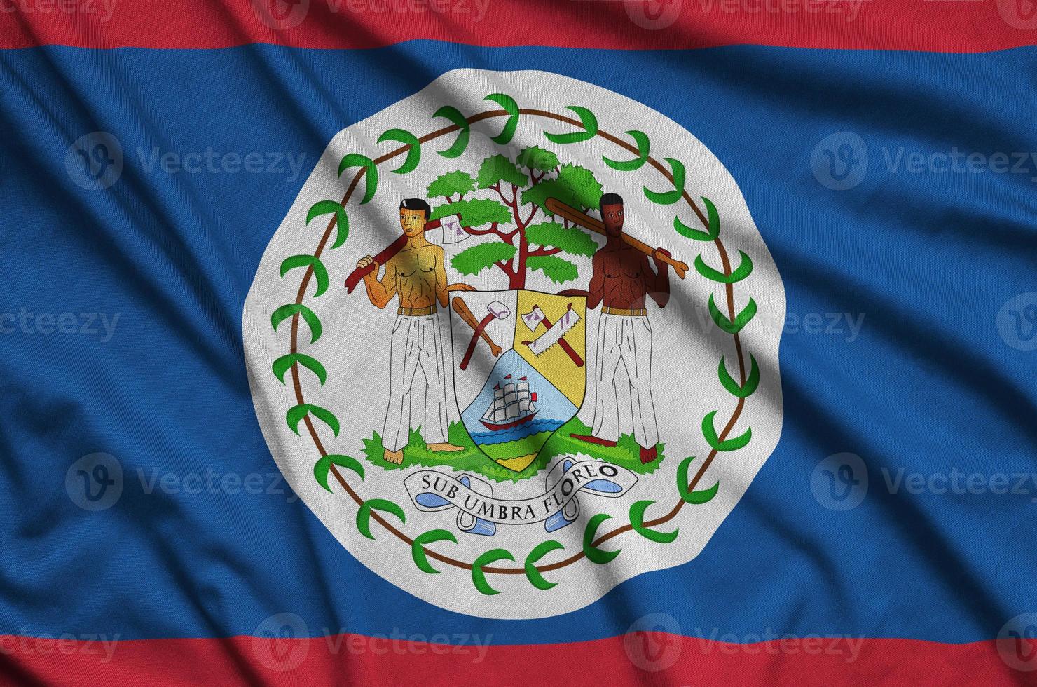 Belize flag is depicted on a sports cloth fabric with many folds. Sport team banner photo