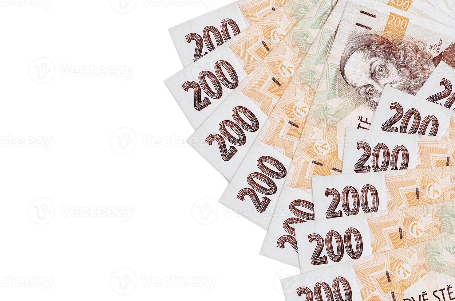 200 Czech korun bills lies isolated on white background with copy space. Rich life conceptual background photo