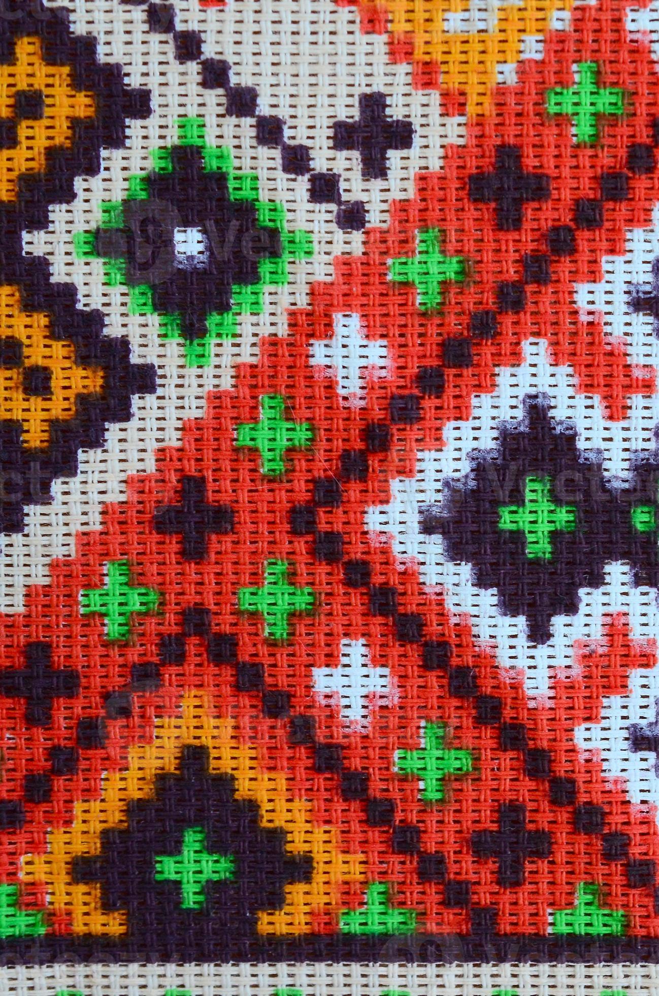 Traditional Ukrainian folk art knitted embroidery pattern on textile