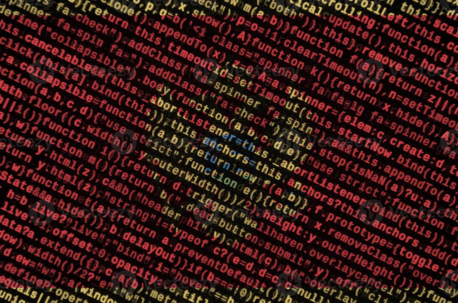 Montenegro flag is depicted on the screen with the program code. The concept of modern technology and site development photo